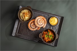 {{photo.Alt || photo.Description || 'Колбаски свиные'}}