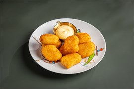 {{photo.Alt || photo.Description || 'Наггетсы с сырным соусом'}}